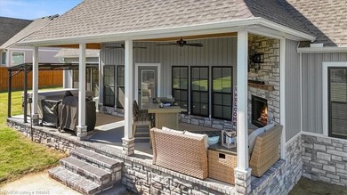 This stunning 4-bedroom, 2-bath home blends modern design with on Wolf Ridge Golf Course in Oklahoma - for sale on GolfHomes.com, golf home, golf lot