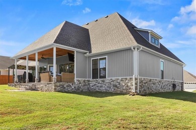 This stunning 4-bedroom, 2-bath home blends modern design with on Wolf Ridge Golf Course in Oklahoma - for sale on GolfHomes.com, golf home, golf lot