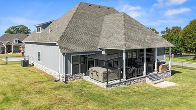 This stunning 4-bedroom, 2-bath home blends modern design with on Wolf Ridge Golf Course in Oklahoma - for sale on GolfHomes.com, golf home, golf lot