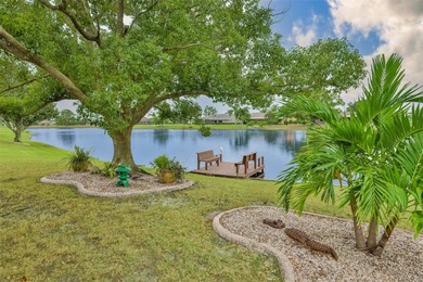 WELCOME TO YOUR OWN PIECE OF PARADISE WITH A WATER VIEW FROM on Caloosa Greens Executive Golf Course in Florida - for sale on GolfHomes.com, golf home, golf lot