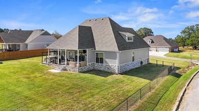 This stunning 4-bedroom, 2-bath home blends modern design with on Wolf Ridge Golf Course in Oklahoma - for sale on GolfHomes.com, golf home, golf lot