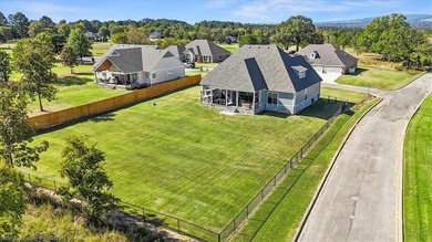 This stunning 4-bedroom, 2-bath home blends modern design with on Wolf Ridge Golf Course in Oklahoma - for sale on GolfHomes.com, golf home, golf lot
