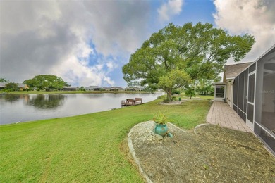 WELCOME TO YOUR OWN PIECE OF PARADISE WITH A WATER VIEW FROM on Caloosa Greens Executive Golf Course in Florida - for sale on GolfHomes.com, golf home, golf lot