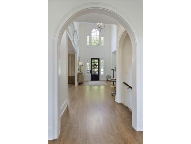 Exquisite and beautifully updated home nestled in the exclusive on The Golf Club of Georgia in Georgia - for sale on GolfHomes.com, golf home, golf lot