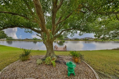 WELCOME TO YOUR OWN PIECE OF PARADISE WITH A WATER VIEW FROM on Caloosa Greens Executive Golf Course in Florida - for sale on GolfHomes.com, golf home, golf lot
