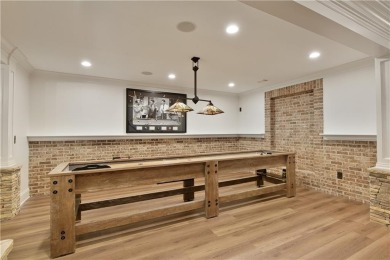 Exquisite and beautifully updated home nestled in the exclusive on The Golf Club of Georgia in Georgia - for sale on GolfHomes.com, golf home, golf lot