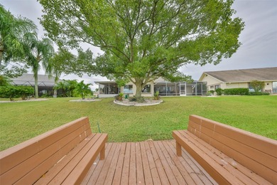 WELCOME TO YOUR OWN PIECE OF PARADISE WITH A WATER VIEW FROM on Caloosa Greens Executive Golf Course in Florida - for sale on GolfHomes.com, golf home, golf lot