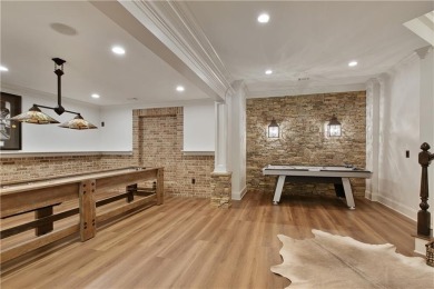 Exquisite and beautifully updated home nestled in the exclusive on The Golf Club of Georgia in Georgia - for sale on GolfHomes.com, golf home, golf lot
