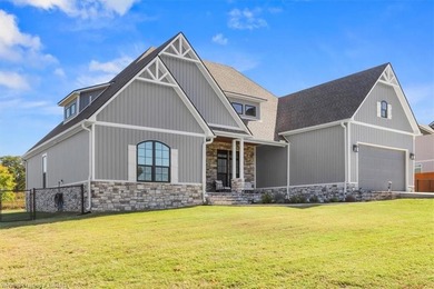 This stunning 4-bedroom, 2-bath home blends modern design with on Wolf Ridge Golf Course in Oklahoma - for sale on GolfHomes.com, golf home, golf lot