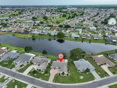 WELCOME TO YOUR OWN PIECE OF PARADISE WITH A WATER VIEW FROM on Caloosa Greens Executive Golf Course in Florida - for sale on GolfHomes.com, golf home, golf lot