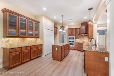 Custom built home in Indian River Preserve Golf Community, sits on Walkabout Golf and Country Club in Florida - for sale on GolfHomes.com, golf home, golf lot