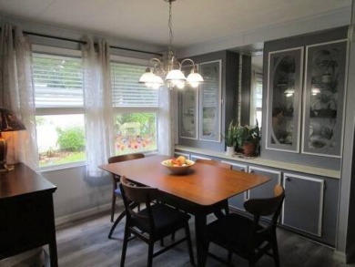 This charming 24 x 40, 2 bedrooms, 2 bath mobile home offers the on Grasslands Golf and Country Club in Florida - for sale on GolfHomes.com, golf home, golf lot