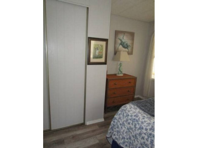 This charming 24 x 40, 2 bedrooms, 2 bath mobile home offers the on Grasslands Golf and Country Club in Florida - for sale on GolfHomes.com, golf home, golf lot