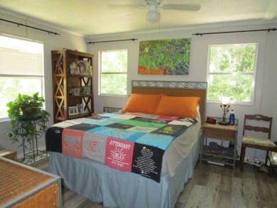 This charming 24 x 40, 2 bedrooms, 2 bath mobile home offers the on Grasslands Golf and Country Club in Florida - for sale on GolfHomes.com, golf home, golf lot