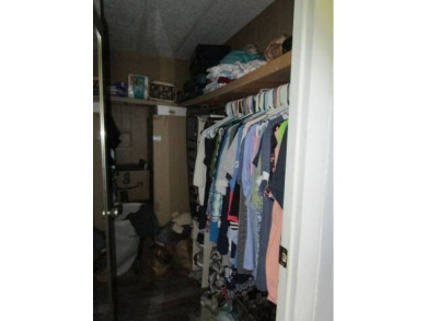 This charming 24 x 40, 2 bedrooms, 2 bath mobile home offers the on Grasslands Golf and Country Club in Florida - for sale on GolfHomes.com, golf home, golf lot