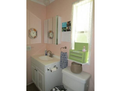This charming 24 x 40, 2 bedrooms, 2 bath mobile home offers the on Grasslands Golf and Country Club in Florida - for sale on GolfHomes.com, golf home, golf lot
