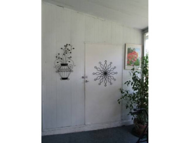 This charming 24 x 40, 2 bedrooms, 2 bath mobile home offers the on Grasslands Golf and Country Club in Florida - for sale on GolfHomes.com, golf home, golf lot
