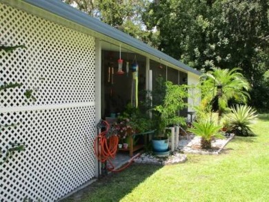This charming 24 x 40, 2 bedrooms, 2 bath mobile home offers the on Grasslands Golf and Country Club in Florida - for sale on GolfHomes.com, golf home, golf lot