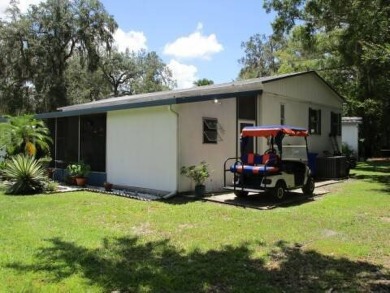This charming 24 x 40, 2 bedrooms, 2 bath mobile home offers the on Grasslands Golf and Country Club in Florida - for sale on GolfHomes.com, golf home, golf lot