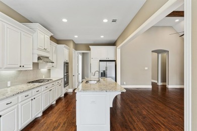 Welcome to this exceptional one-story Highland Homes beauty in on Lantana Golf Club in Texas - for sale on GolfHomes.com, golf home, golf lot
