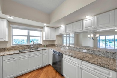 Here is your LOVELY LUXURY LAKEFRONT CORNER CONDO with beautiful on East Bay Golf Club in Florida - for sale on GolfHomes.com, golf home, golf lot