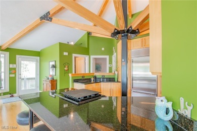 Paradise found! This one-of-a-kind, custom-built octagon-shaped on Turkeyfoot Lake Golf Links in Ohio - for sale on GolfHomes.com, golf home, golf lot