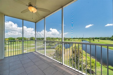 Here is your LOVELY LUXURY LAKEFRONT CORNER CONDO with beautiful on East Bay Golf Club in Florida - for sale on GolfHomes.com, golf home, golf lot