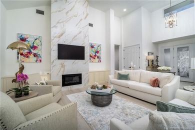 Nestled on spectaular premium lot with full lake and golf course on Willoughby Golf Club in Florida - for sale on GolfHomes.com, golf home, golf lot