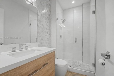 Completely renovated and rarely available first-floor residence on Granada Golf Club in Florida - for sale on GolfHomes.com, golf home, golf lot