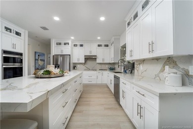 Nestled on spectaular premium lot with full lake and golf course on Willoughby Golf Club in Florida - for sale on GolfHomes.com, golf home, golf lot