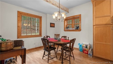 Welcome to this enchanting rustic retreat nestled within the on The Club At Old Kinderhook in Missouri - for sale on GolfHomes.com, golf home, golf lot