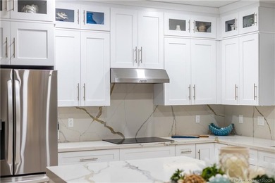 Nestled on spectaular premium lot with full lake and golf course on Willoughby Golf Club in Florida - for sale on GolfHomes.com, golf home, golf lot