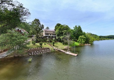 Lake Nottely Retreat boasts spacious 4BR-3BA home. Upon entry on Butternut Creek Golf Course in Georgia - for sale on GolfHomes.com, golf home, golf lot