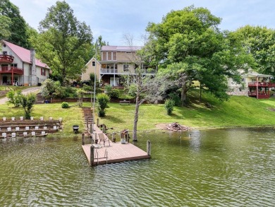 Lake Nottely Retreat boasts spacious 4BR-3BA home. Upon entry on Butternut Creek Golf Course in Georgia - for sale on GolfHomes.com, golf home, golf lot