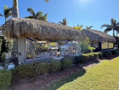 STUNNING NORTH-FACING PULL-IN LOT WITH WATER VIEWS! This lot is on Motorcoach Resort Golf Course in Florida - for sale on GolfHomes.com, golf home, golf lot