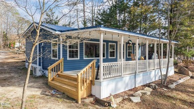 WONDERFUL LAKEFRONT GET-AWAY IS WAITING For You at Beautiful on River Golf and Country Club at Lake Royale in North Carolina - for sale on GolfHomes.com, golf home, golf lot