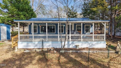 WONDERFUL LAKEFRONT GET-AWAY IS WAITING For You at Beautiful on River Golf and Country Club at Lake Royale in North Carolina - for sale on GolfHomes.com, golf home, golf lot