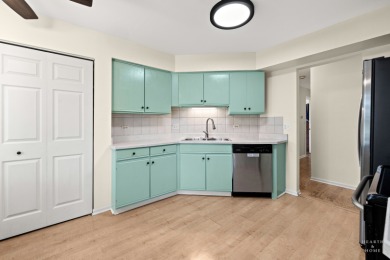 Welcome to this light and bright 2nd-floor end unit in the on The Golf Club of Illinois in Illinois - for sale on GolfHomes.com, golf home, golf lot