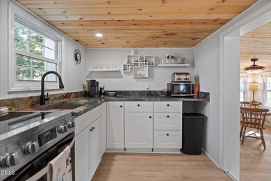 WONDERFUL LAKEFRONT GET-AWAY IS WAITING For You at Beautiful on River Golf and Country Club at Lake Royale in North Carolina - for sale on GolfHomes.com, golf home, golf lot