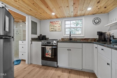 WONDERFUL LAKEFRONT GET-AWAY IS WAITING For You at Beautiful on River Golf and Country Club at Lake Royale in North Carolina - for sale on GolfHomes.com, golf home, golf lot