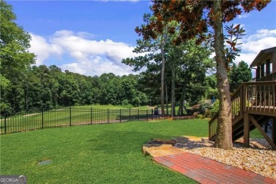 Enjoy Unbeatable views from Morning Coffee to Golden Hour - on Hamilton Mill Golf Club in Georgia - for sale on GolfHomes.com, golf home, golf lot