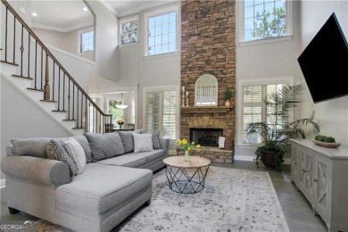 Enjoy Unbeatable views from Morning Coffee to Golden Hour - on Hamilton Mill Golf Club in Georgia - for sale on GolfHomes.com, golf home, golf lot