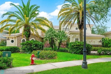 Highly desirable 2-story, coach home in the prestigious Caseras on Parkland Golf Club in Florida - for sale on GolfHomes.com, golf home, golf lot