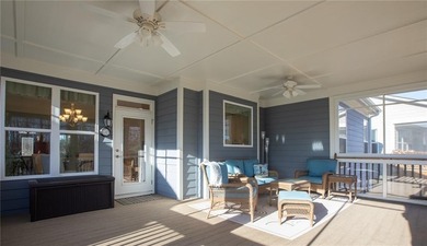 Discover relaxed, resort-style living in this charming on Lanier Island Legacy Golf Couorse in Georgia - for sale on GolfHomes.com, golf home, golf lot