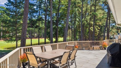 Beautifully positioned on a private, oversized lot near on Pinewild Country Club of Pinehurst in North Carolina - for sale on GolfHomes.com, golf home, golf lot