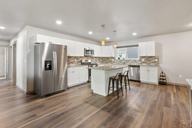 Welcome home to this stylish and spacious 5 bedroom, 3 bathroom on Four Mile Ranch Golf Club in Colorado - for sale on GolfHomes.com, golf home, golf lot