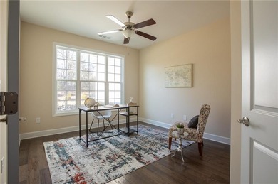 Discover relaxed, resort-style living in this charming on Lanier Island Legacy Golf Couorse in Georgia - for sale on GolfHomes.com, golf home, golf lot