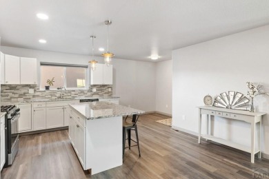 Welcome home to this stylish and spacious 5 bedroom, 3 bathroom on Four Mile Ranch Golf Club in Colorado - for sale on GolfHomes.com, golf home, golf lot