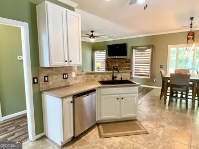 Welcome to 2156 Racoon Court, located in Mirror Lake, a 36 holes on Mirror Lake Golf Club in Georgia - for sale on GolfHomes.com, golf home, golf lot
