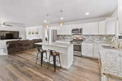 Welcome home to this stylish and spacious 5 bedroom, 3 bathroom on Four Mile Ranch Golf Club in Colorado - for sale on GolfHomes.com, golf home, golf lot